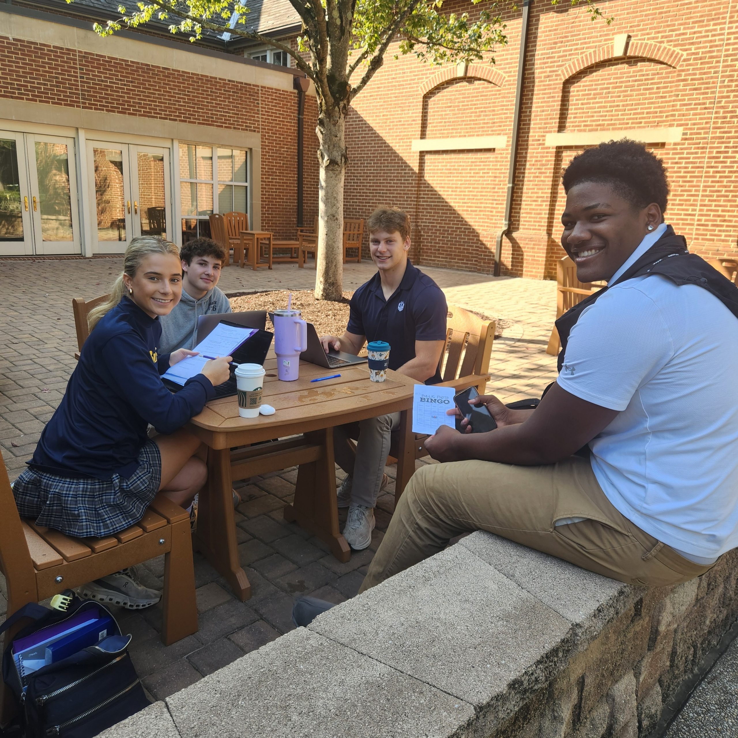 Bullis students studying outside on campus